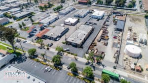aerial roof, street, and parking lot view of industrial building for sale or lease in Upland, CA